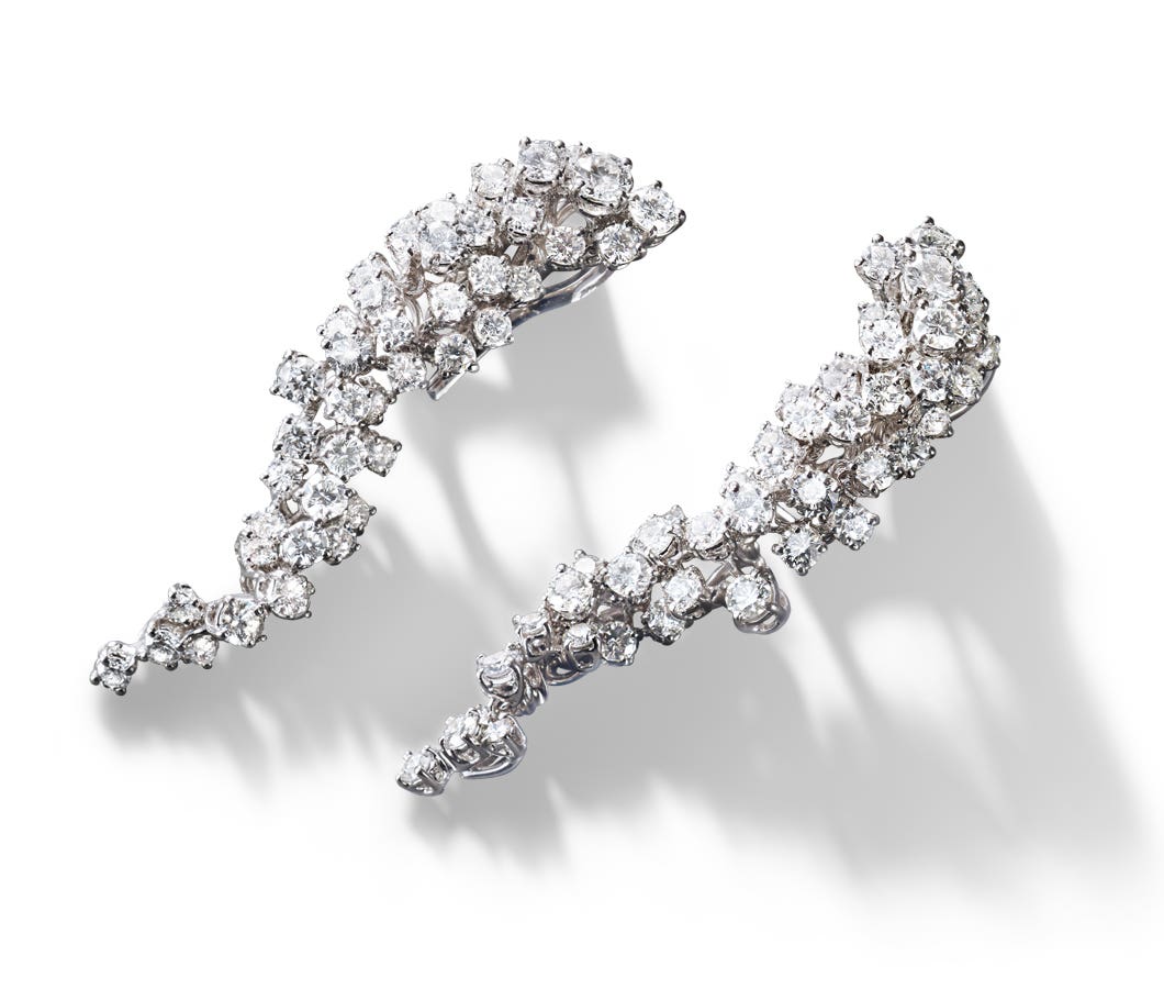 White gold earrings with 7.92-carat brilliant diamonds
